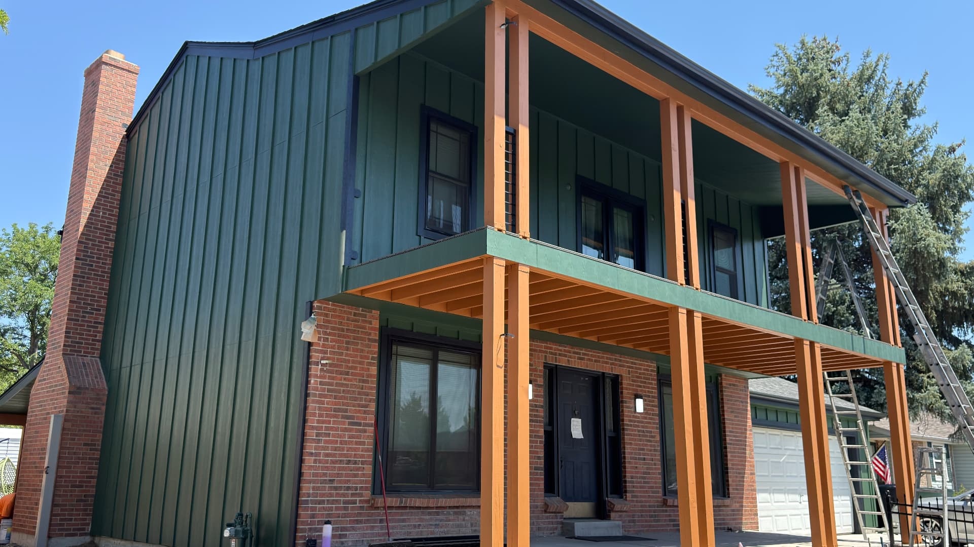 Green Siding & Cedar Columns
